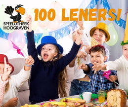Foto van kinderen die hoera roepen omdat de Speelotheek Hoograven meer dan 100 leners telt.